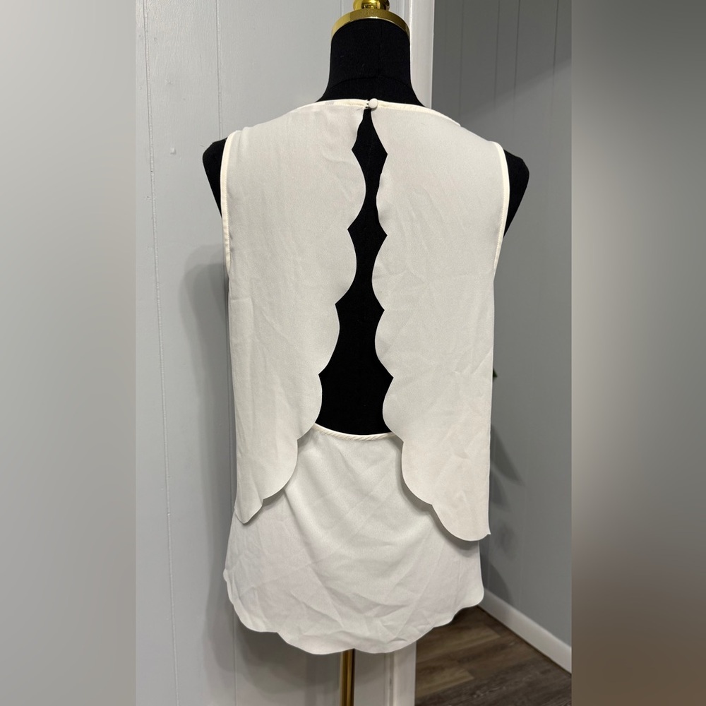 #8)  Scalloped White Sleeveless Top